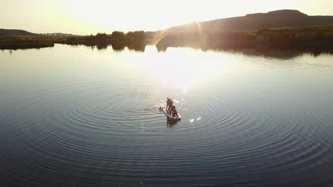 Aerial Shoot Of A Group Of Sup Surfers Floating In Harfravatn Lake In Iceland Stock Footage 118348707