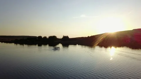 Aerial Shoot Of A Group Of Sup Surfers Floating In Harfravatn Lake In Iceland Stock Footage 118357002