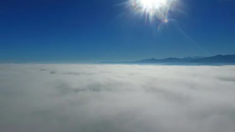 Aerial Shoot over clouds in the sun Stock Footage 139515391