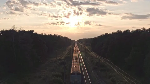 Aerial shooting over train in the forest roadю European landscape Stock Footage 91177779