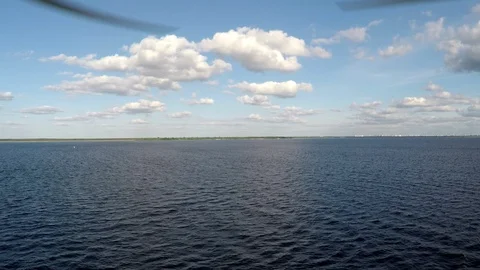 Aerial shooting over the water surface Stock Footage 99083527