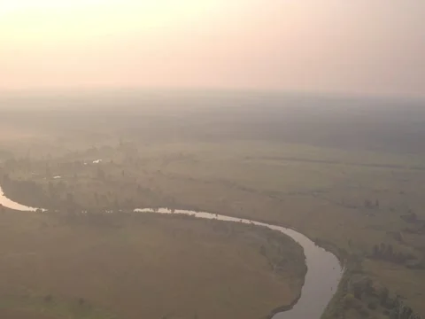 Aerial shooting of river, nature, fields and trees #11 動画素材 83557641
