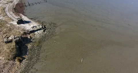 Aerial shoreline pull shot Stock Footage 86956435