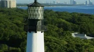 Aerial Shoreline View At Sunrise Of Cape Florida Lighthouse Key Biscayne State Stock Footage