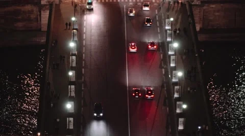 Aerial short angle view of traffic on a bridge - Paris by night landscape Stock Footage 58764613