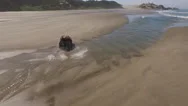 Aerial Shot Of 4X4 Off Road Vehicle Driving On Beach Stock Footage