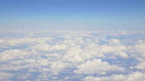 Aerial shot above the clouds in 4K Stock Footage 78636065