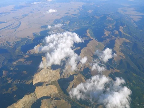 Aerial shot above the clouds in 4K Stock Footage 80589812