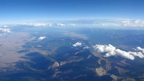Aerial shot above the clouds in 4K Stock Footage