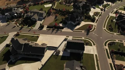 Aerial shot above upper class suburban neighborhood with big yards Stock Footage 130667309