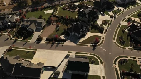 Aerial shot above upper class suburban neighborhood with big yards Stock Footage 146923145