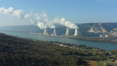 Aerial shot of an active nuclear power plant along a river, Cruas, France Stock Footage 292808694