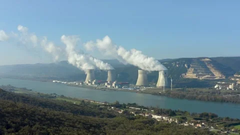 Aerial shot of an active nuclear power plant along a river, Cruas, France Stock Footage 292808711