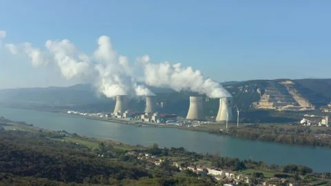 Aerial shot of an active nuclear power plant along a river, Cruas, France Stock Footage 292808732