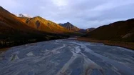 Aerial Shot Of Alaska River And Mountain Landscape Showing Unique Patterns. Stock Footage