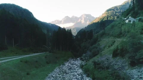 Aerial shot along a river between mountains Stock Footage 164542927