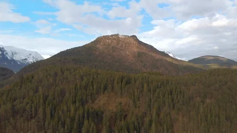 Aerial shot of antenna mast on mountain top Stock Footage 129428341