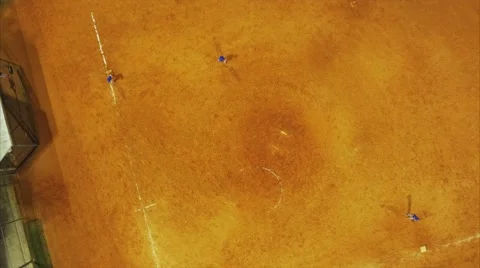 Aerial shot approaching middle of baseball field during practice Stock Footage 68999655