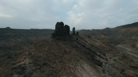 Aerial shot approaching a rock formation known as El Camello on Medio Almud Stock Footage 228282902