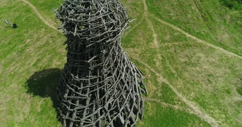 Aerial shot art object Lighthouse On Ugra, Nikola Lenivets, Kaluga, Russia Stock Footage 135908013