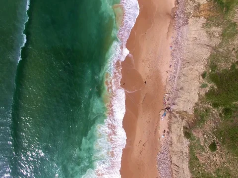Aerial shot of the Atlantic ocean coastline in Portugal. Top view of the waves. Stock Footage