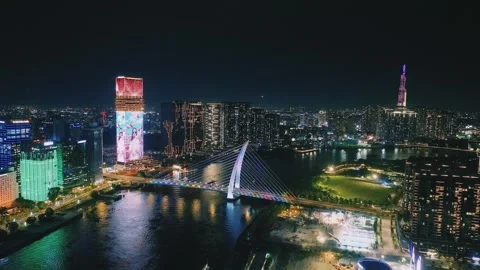 Aerial Shot of Ba Son Bridge and Saigon River Skyline at Night Video stock 341216016