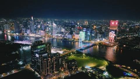 Aerial Shot of Ba Son Bridge and Saigon River Skyline at Night Video stock 341216056