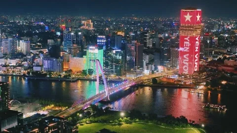 Aerial Shot of Ba Son Bridge and Saigon River Skyline at Night Video stock 341216951