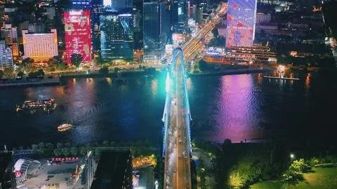 Aerial Shot of Ba Son Bridge and Saigon River Skyline at Night Video stock 341217423