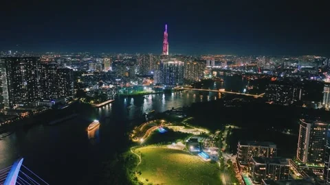 Aerial Shot of Ba Son Bridge and Saigon River Skyline at Night Video stock 341217591