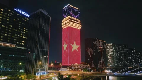 Aerial Shot of Ba Son Bridge and Saigon River Skyline at Night Video stock 341217650