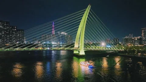 Aerial Shot of Ba Son Bridge and Saigon River Skyline at Night Video stock 341217907