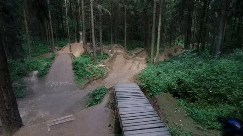 Aerial shot back view MTB BMX dirt jump Video stock 67504776