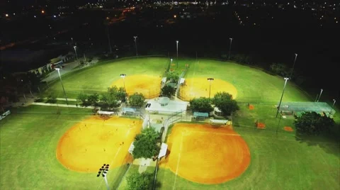 Aerial shot of baseball fields at night. Stock Footage 68997093