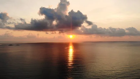Aerial shot of beach and sea during sunrise on Tioman Island Stock Footage