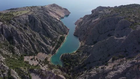 Aerial shot of beautiful cliffs over Zavratnica cove, Jablanac, Croatia Stock Footage 277305098