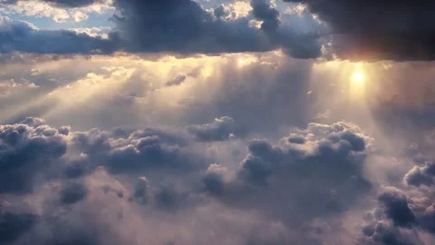 An aerial shot of beautiful cloudscape with sun rays coming through the clouds Stock Footage 229657229