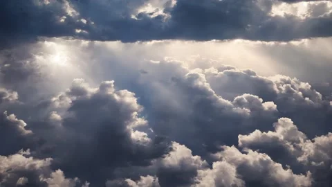 An aerial shot of beautiful cloudscape with sun rays coming through the clouds Stock Footage 229720210
