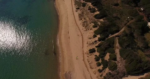 Aerial shot, beautiful empty beach in Elba island with its gorgeous sea  Stock Footage 74224089