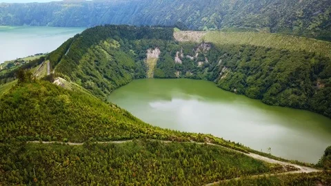 Aerial shot of a beautiful mountain lake on sao miguel an island of the azores Stock Footage 94384553