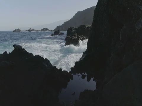 Aerial shot of beautiful waves in tenerife island in 4k Stock Footage 84068853