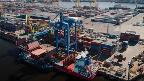 Aerial shot of Big Cargo container ship in marine port Saint Petersburg Stock Footage