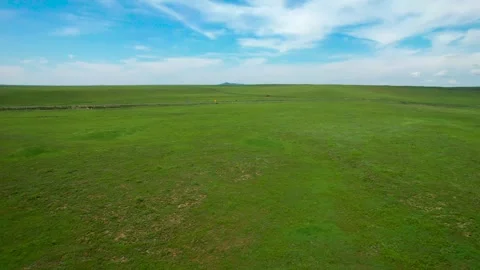 Aerial Shot of Boundless Flat Green Grassland Gentle Plain Inner Mongolia China Stock Footage 337980157