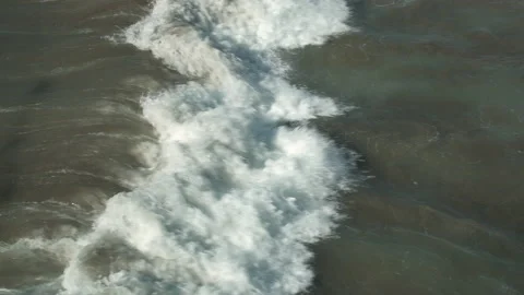 Aerial shot of breaking waves Stock Footage 137359775