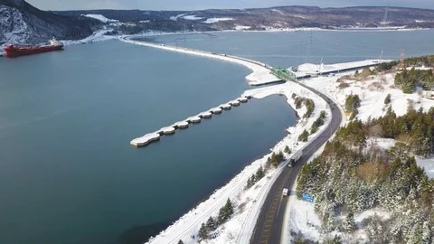 Aerial Shot of bridge and lock with snow and water, Nova Scotia, Canada Stock Footage 101649553