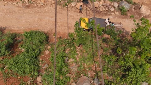Aerial shot of bridge construction workers in India Stock Footage 111522651