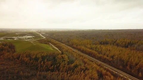 Aerial shot of brown tree forests in Autumn with rail way , Nova Scotia, Canada Stock Footage 102247374