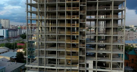 Aerial Shot of the Building in Process of Construction. Labor working in big Video stock 113581113