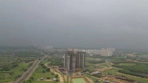 Aerial shot of a building under construction. 4k indian stock video of dwarka Stock Footage 163747460