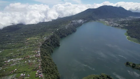 Aerial shot of Buyan Lake with clouds below. Wanagiri, Bali, Indonesia. Stock Footage 285993676